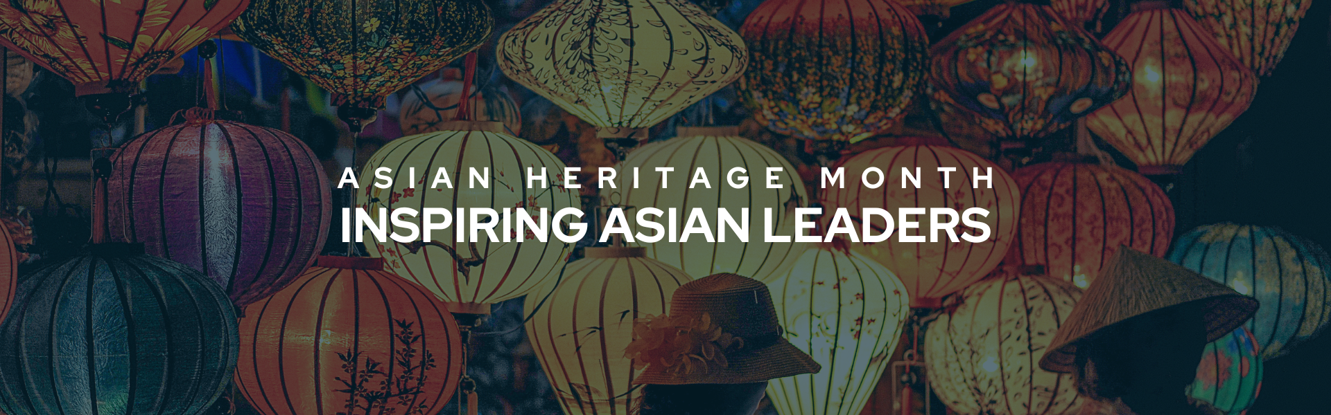 Banner that reads "Asian Heritage Month Inspiring Asian Leaders" in bold white font. The background image shows a plethora of colourful Asian lanterns.