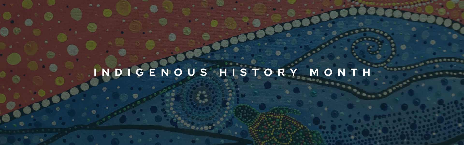 A decorative banner to celebrate Indigenous speakers in Canada. Orange and blue-painted Indigenous artwork covers the background. The title reads "Indigenous History Month" in bold white font in the centre of the banner.