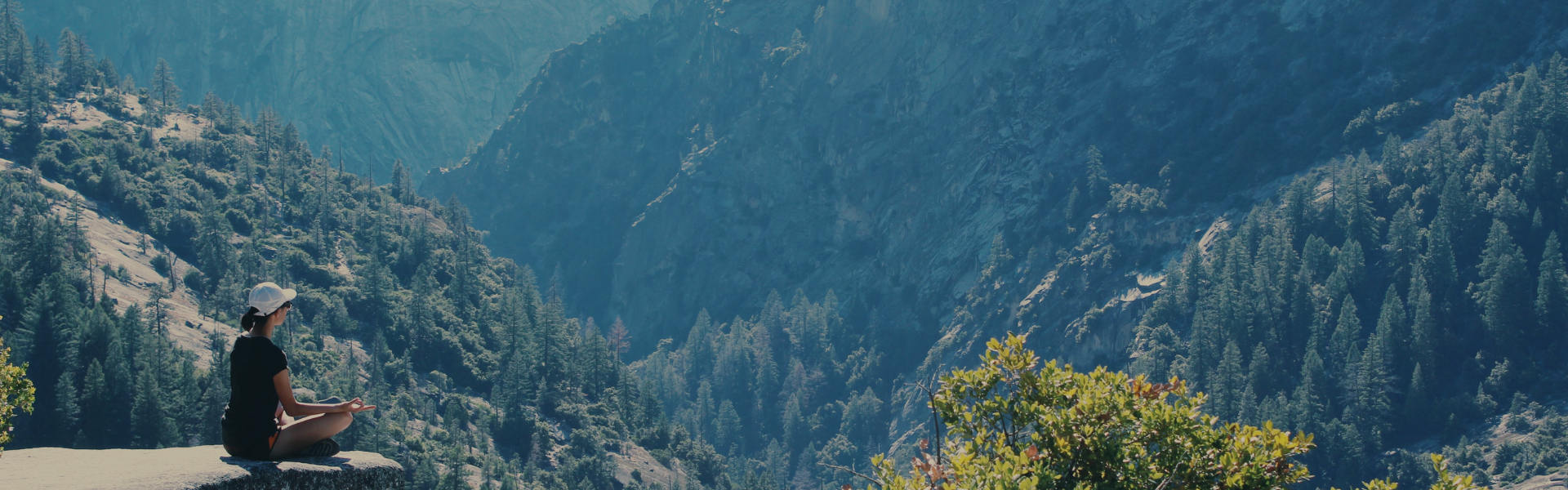 Decorative banner of a scenic, outdoor mountainous view to go along with the topic of the blog, "How to Book a Keynote Speaker for Retreats | Planning Guide."