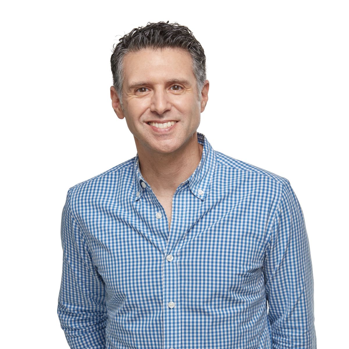 Headshot of keynote speaker, Chad Millman, standing in front of a solid, white backdrop.