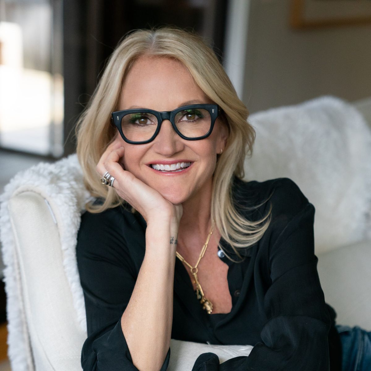 Professional headshot of keynote speaker, Mel Robbins.